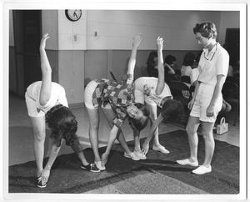 [Photograph of a Group of Women Stretching]