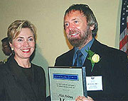 Hillary Clinton presents the National Heritage Fellowship to Mick Moloney