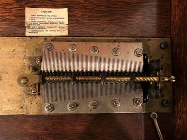 overhead view of the two combs and arm of the Regina Music Box