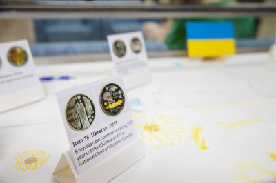 close-up of display featuring musical Ukrainian coins
