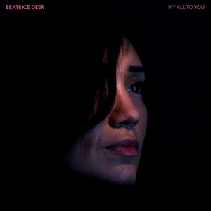 cover art with black background and woman's face gazing off to the side