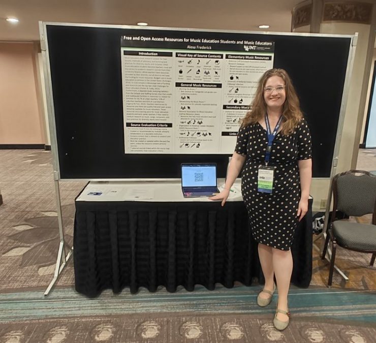 Woman standing in front of poster at conference