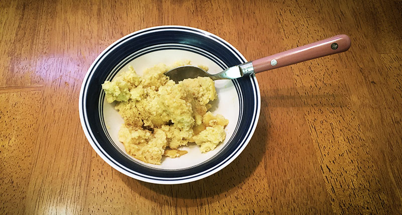 Suggested serving of spoon bread in a bowl.