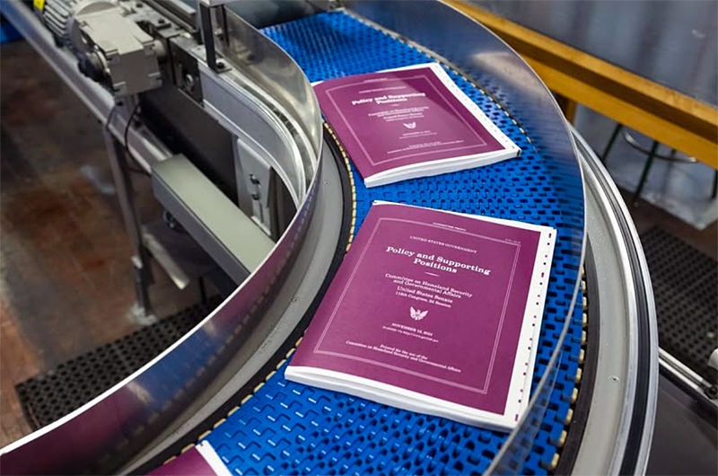 A new edition of the "Plum Book" being processed at the U.S. Government Printing Office.